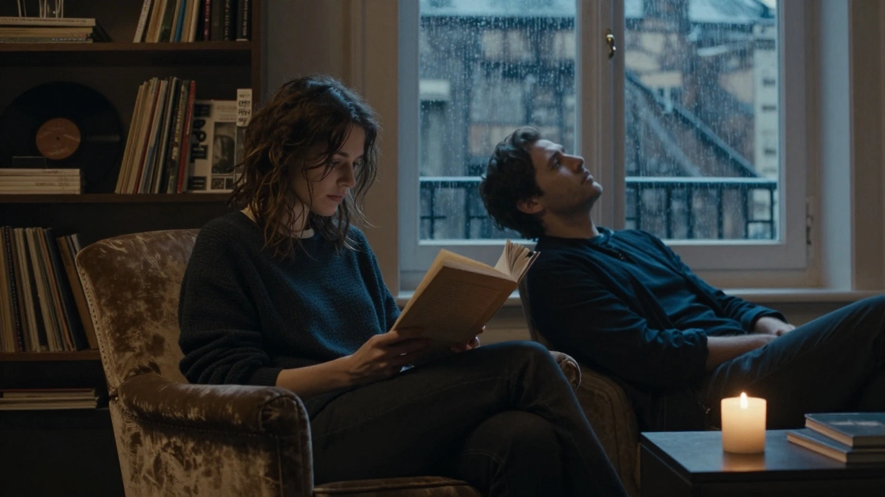 A woman reads poetry aloud to a man in a softly lit Paris apartment, rain on the window.